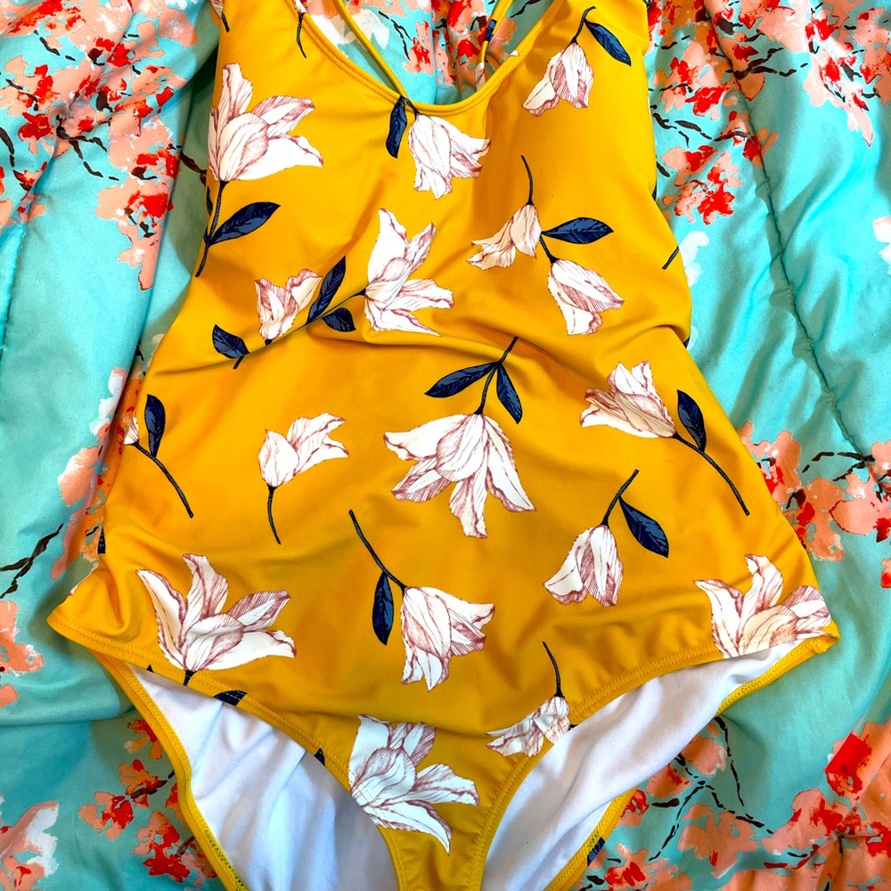 Cute yellow/gold one piece lace back